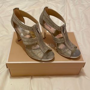 NIB Michael Kors brand women’s size 9 Berkeley T-strap Glitter heels in silver